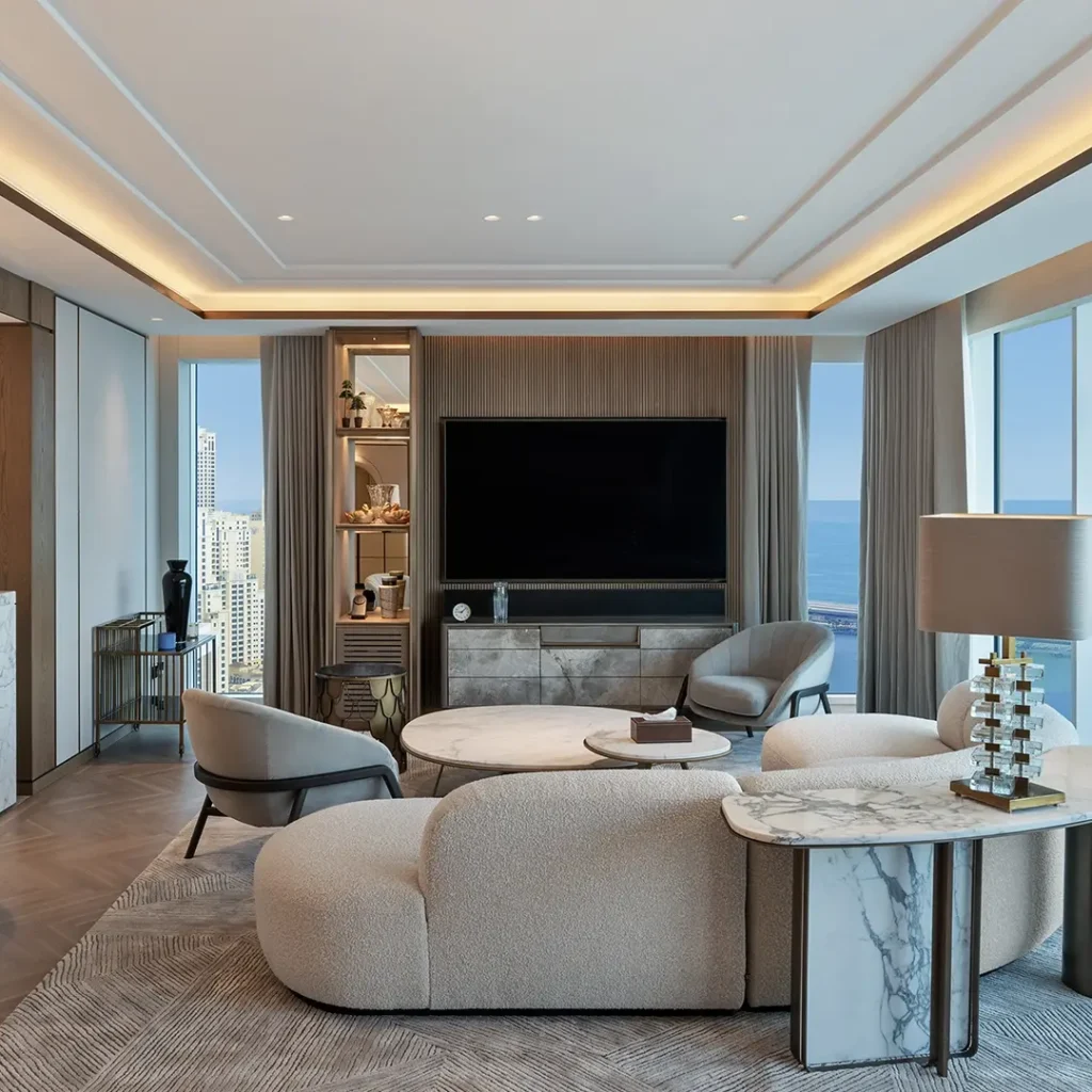 High-end residential interior design in Dubai with contemporary furniture, marble details and sea views