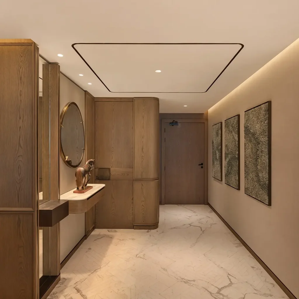 Apartment entrance fit out in Dubai featuring custom wood joinery, marble flooring and integrated lighting
