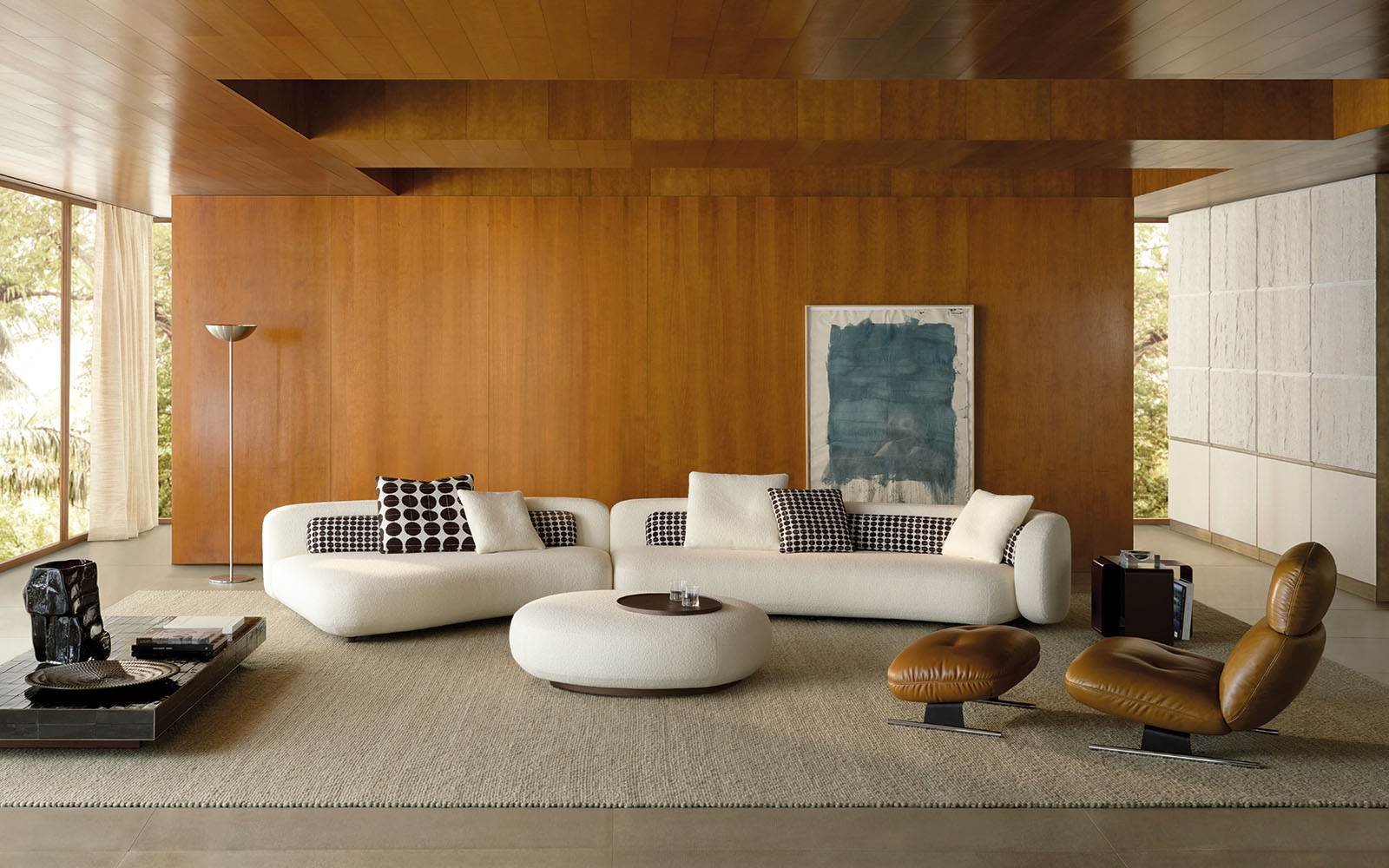 Custom furniture in Dubai featuring bespoke curved sofas and lounge seating tailored to a contemporary living room